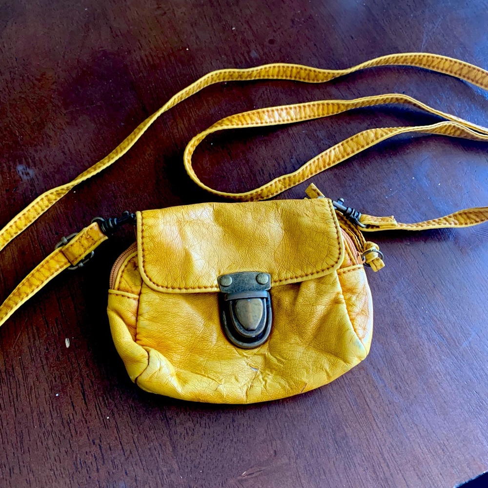 Worn a few times. Mustard crossbody tiny purse